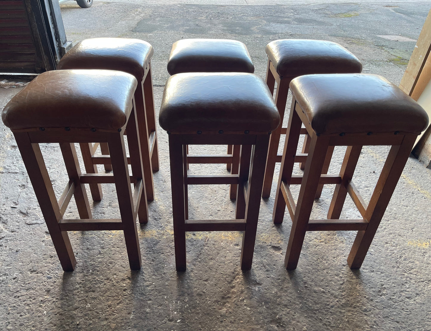 Matching set of 6 tan leather bar stools with square tops