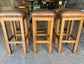 Matching set of 6 tan leather bar stools with square tops