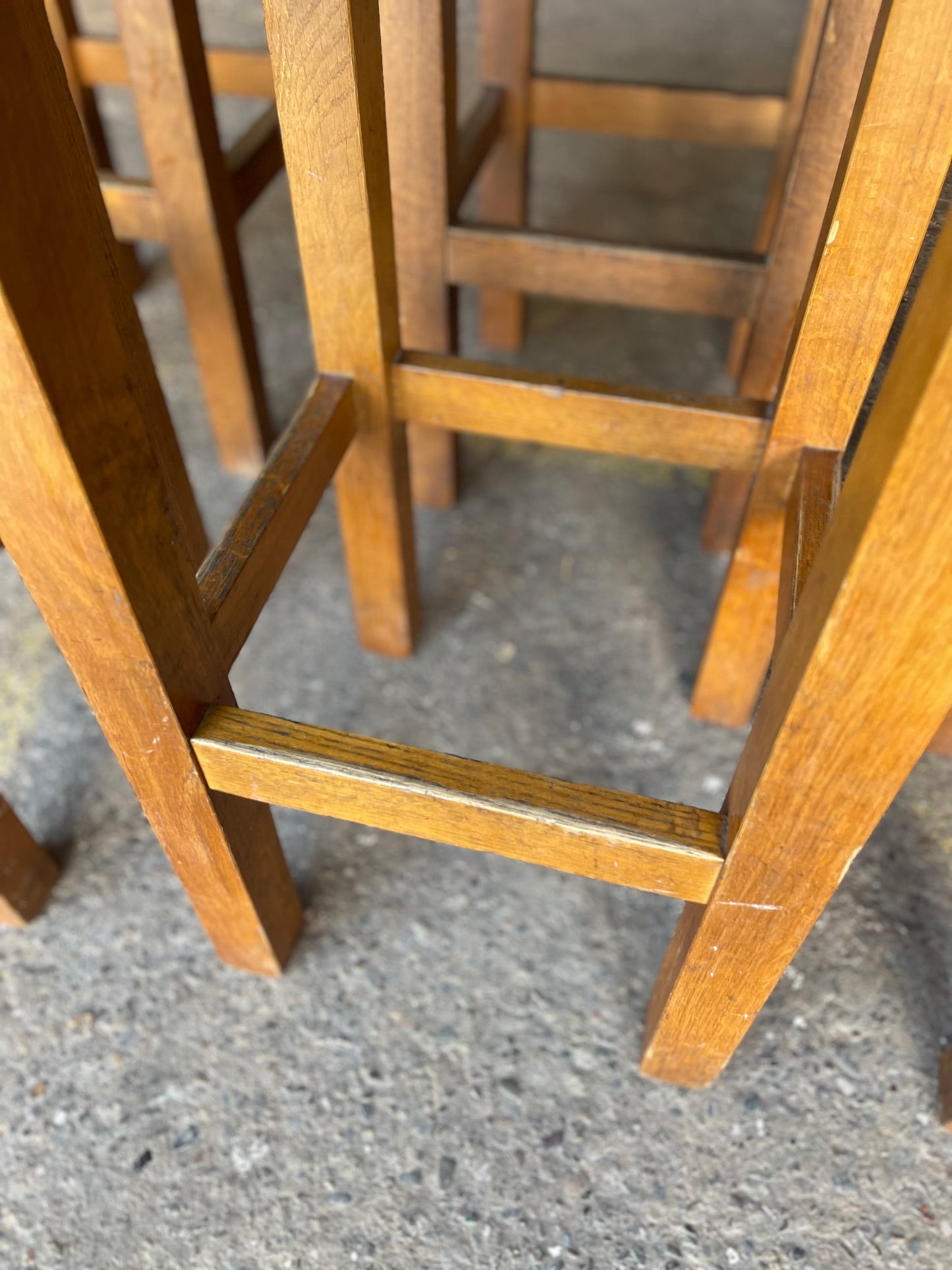 Matching set of 6 tan leather bar stools with square tops
