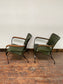 Pair of green leather armchairs with metal frame