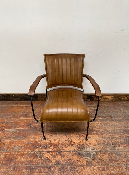 Reclined tan / brown leather armchair