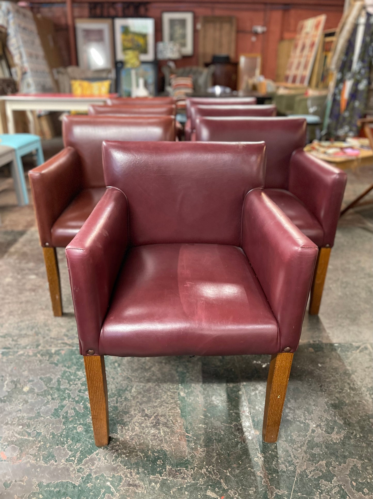 Set of 7 leather-effect tub chairs in two shades of red