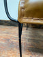 Reclined tan / brown leather armchair