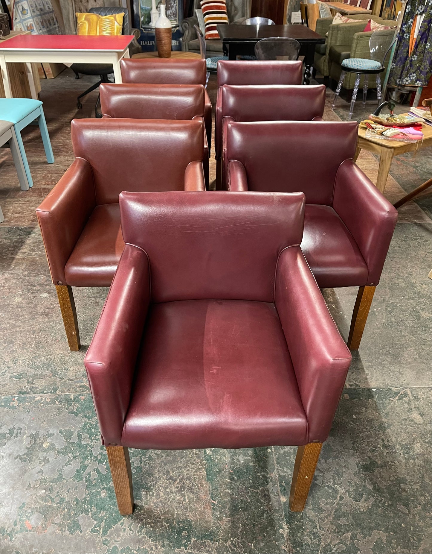 Set of 7 leather-effect tub chairs in two shades of red