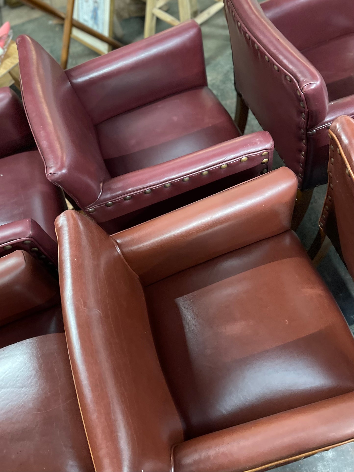 Set of 7 leather-effect tub chairs in two shades of red