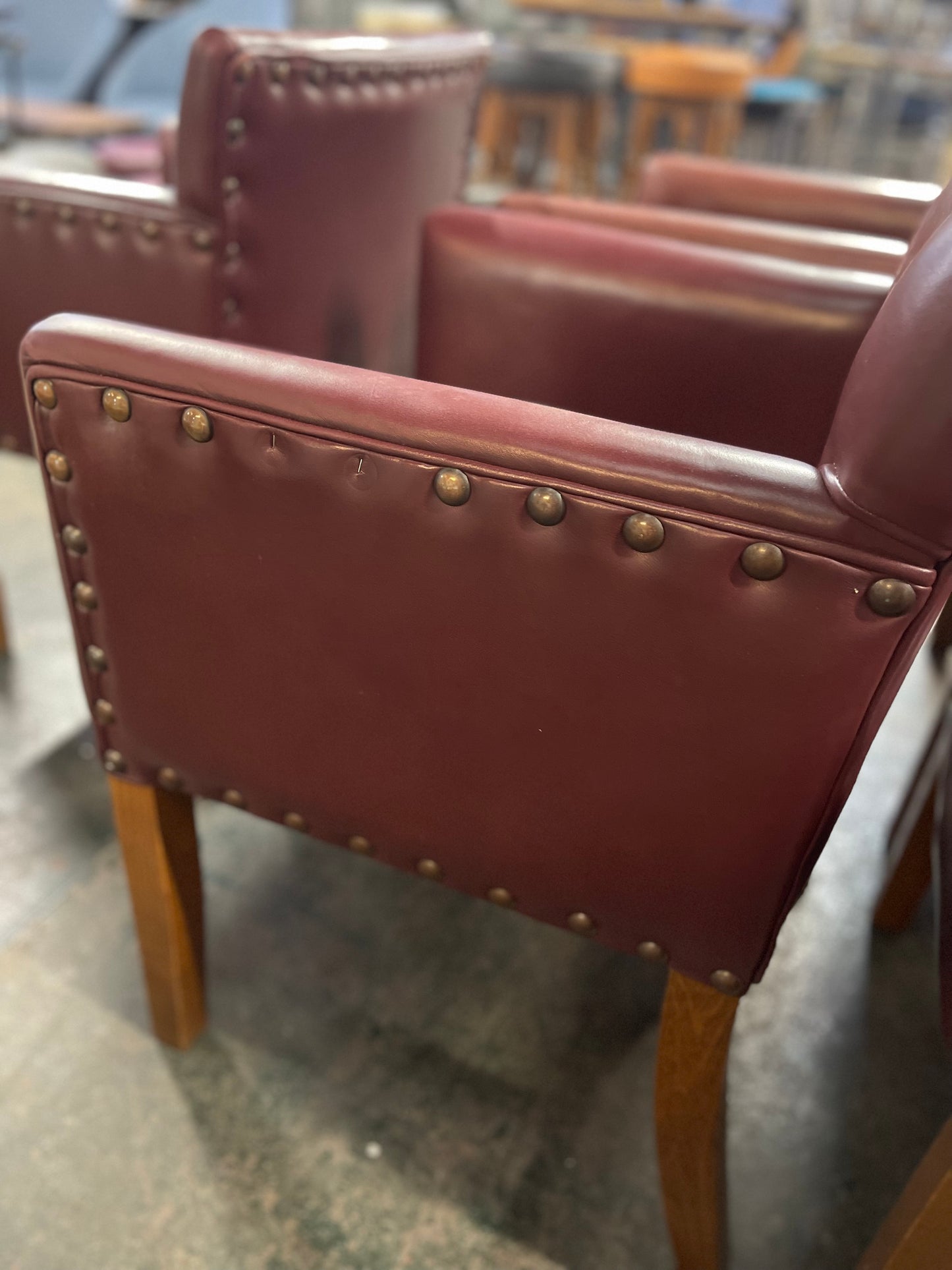 Set of 7 leather-effect tub chairs in two shades of red