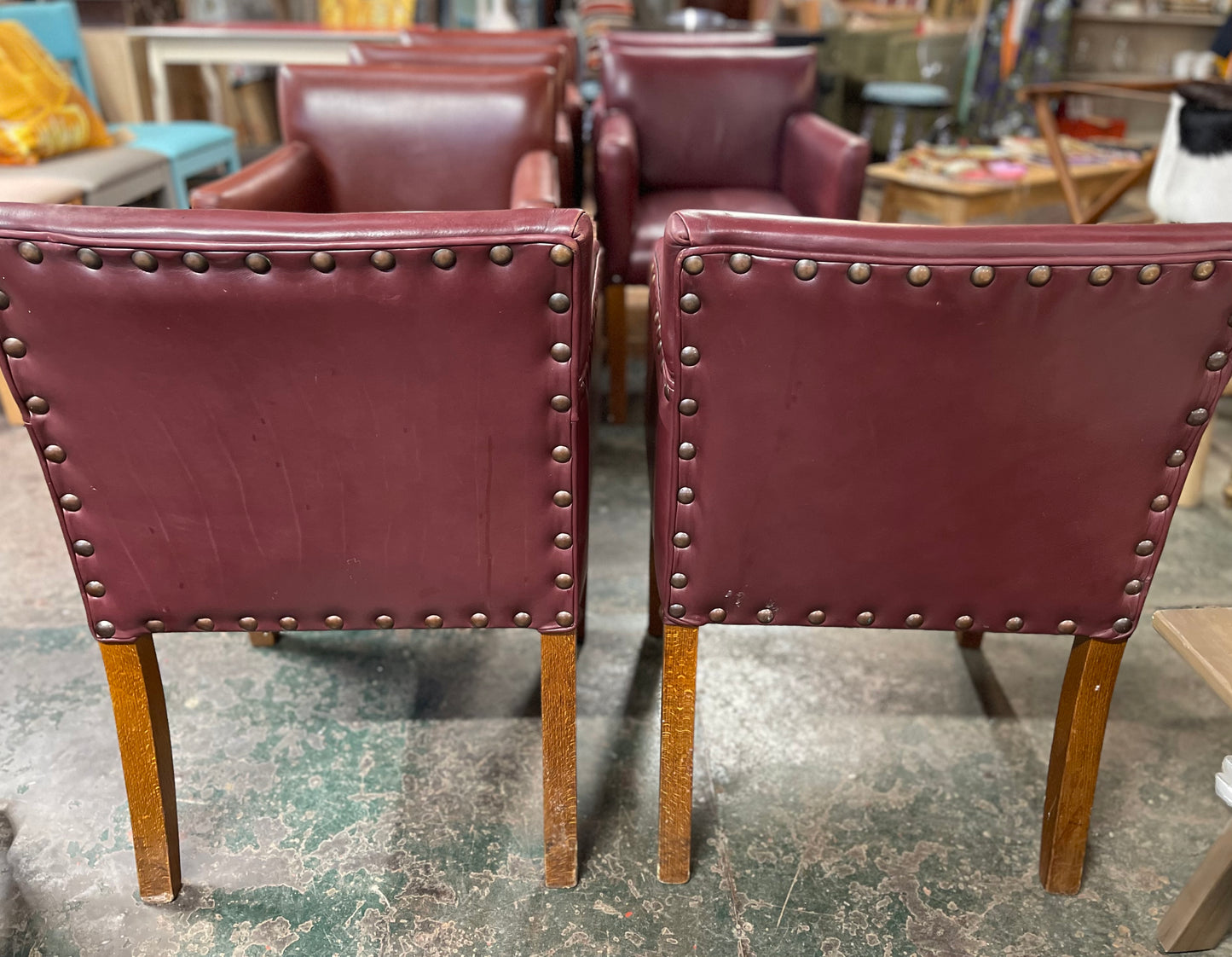 Set of 7 leather-effect tub chairs in two shades of red