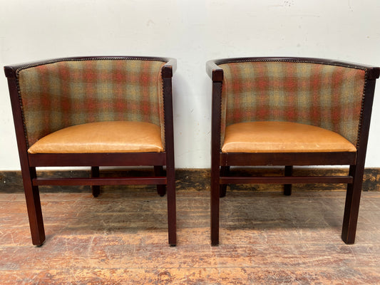Pair of tan leather and check fabric tub chairs
