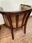 Pair of tan leather and check fabric tub chairs