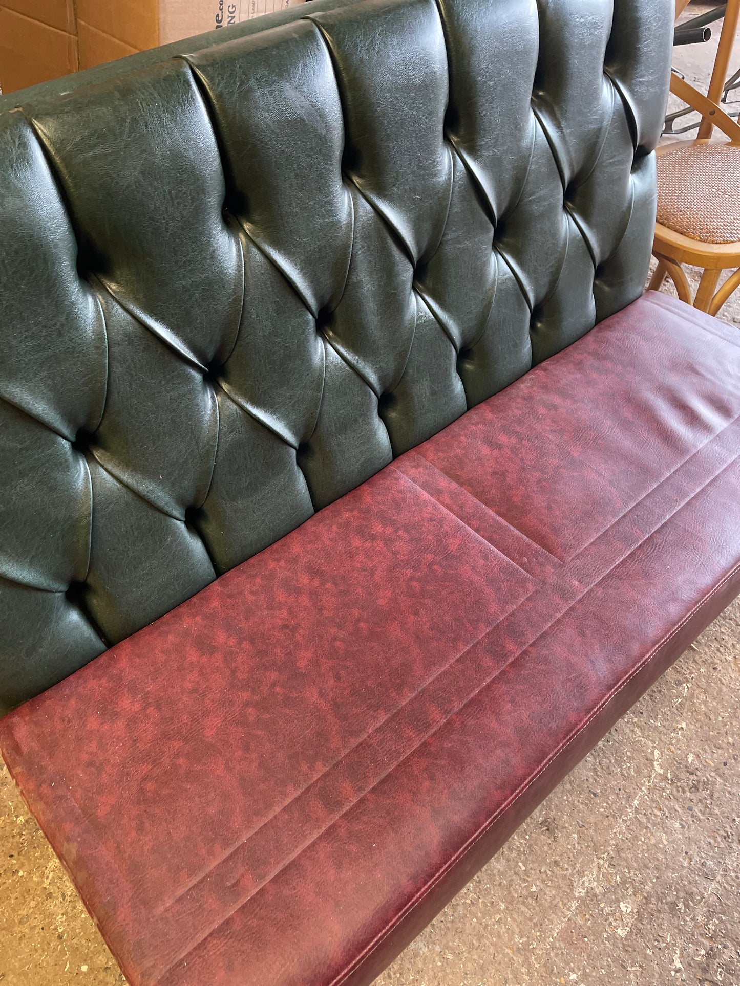 Single fixed seating pub bench in red green faux-leather