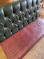 Single fixed seating pub bench in red green faux-leather