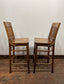 Set of five wooden pub bar stools with backrests