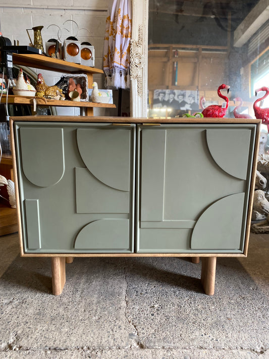 Stylish cabinet with geometric door design