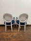 Pair of white shabby chic chairs with blue seats