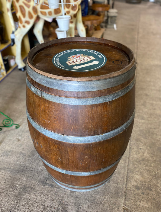 Solid wood barrel with metal bands