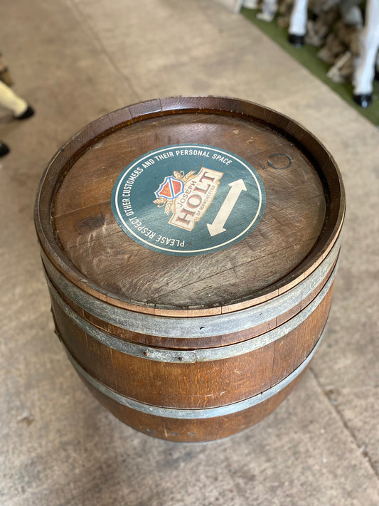 Solid wood barrel with metal bands