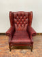 Stunning red leather wingback armchair