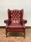 Stunning red leather wingback armchair