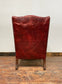 Stunning red leather wingback armchair