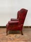 Stunning red leather wingback armchair