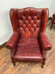 Stunning red leather wingback armchair