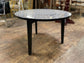 Black and white round coffee table with graphic print