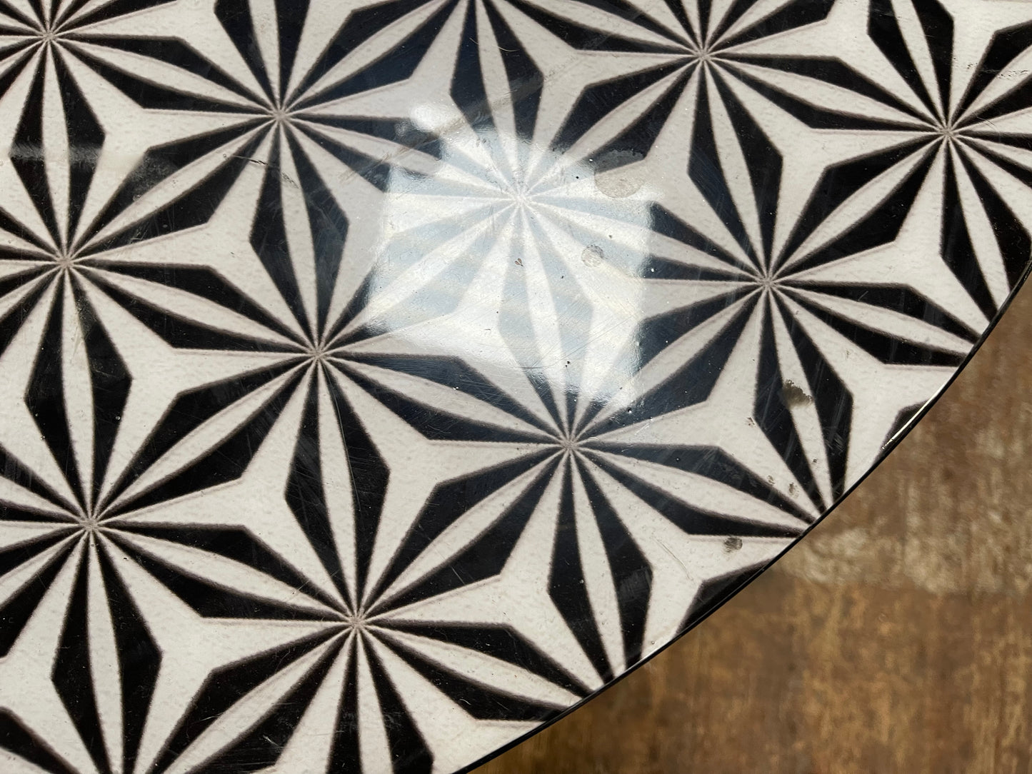 Black and white round coffee table with graphic print