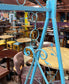 Blue metal garden swing seat