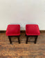 Low bar stools with red velvet-feel tops