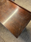Small vintage chest of drawers in dark wood