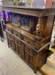 Antique solid oak tall sideboard / cabinet with ornate carvings