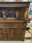 Antique solid oak tall sideboard / cabinet with ornate carvings