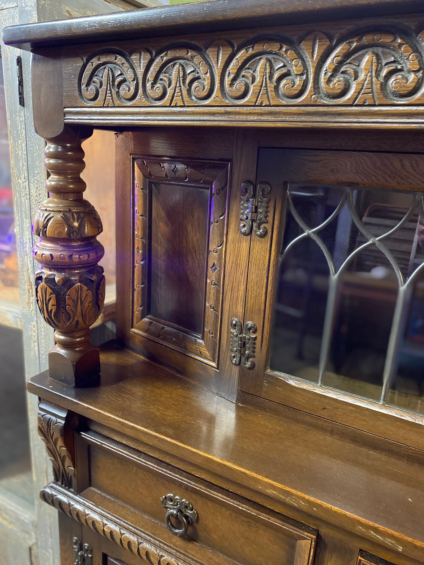 Antique solid oak tall sideboard / cabinet with ornate carvings