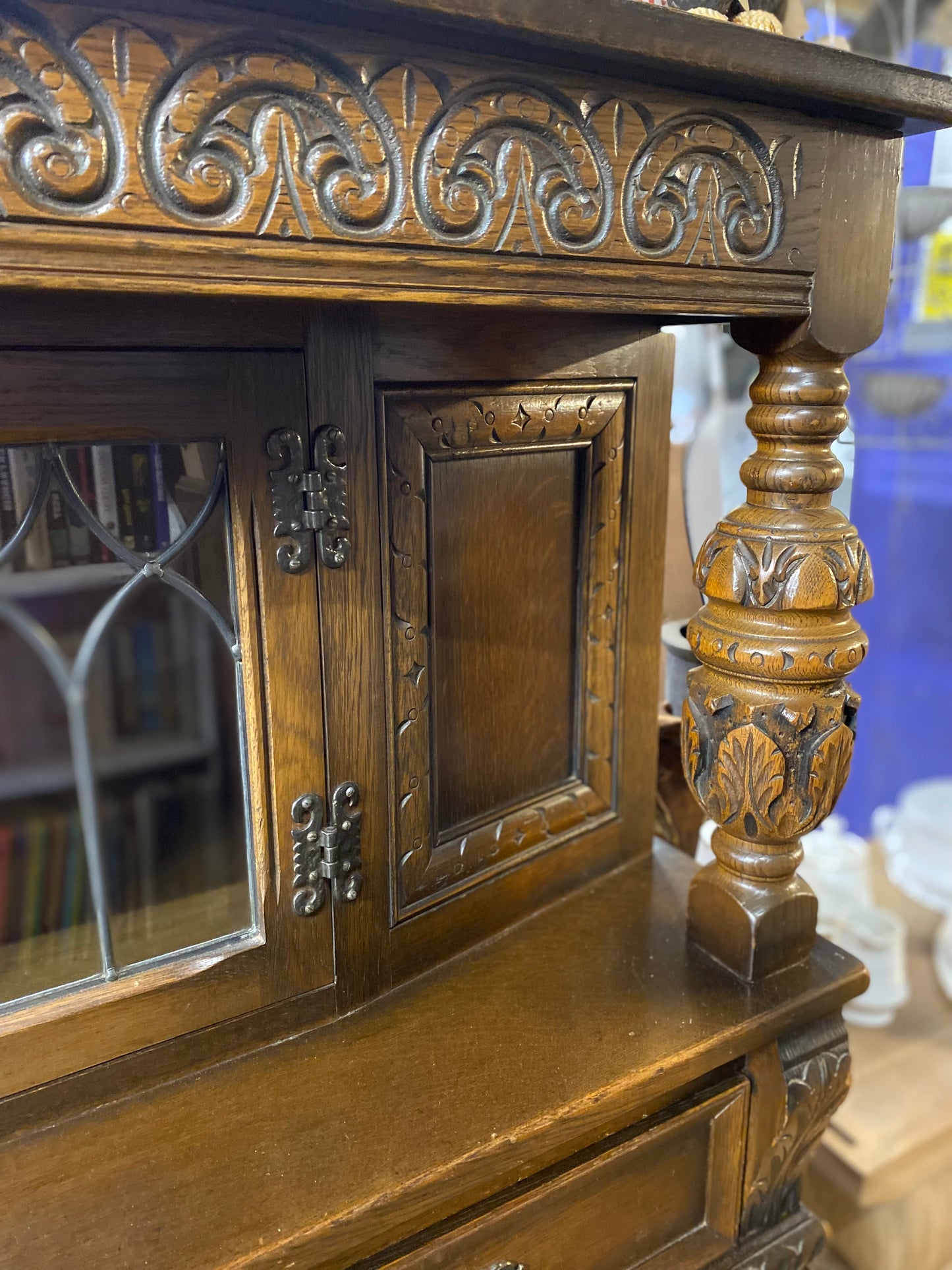 Antique solid oak tall sideboard / cabinet with ornate carvings