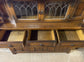 Antique solid oak tall sideboard / cabinet with ornate carvings