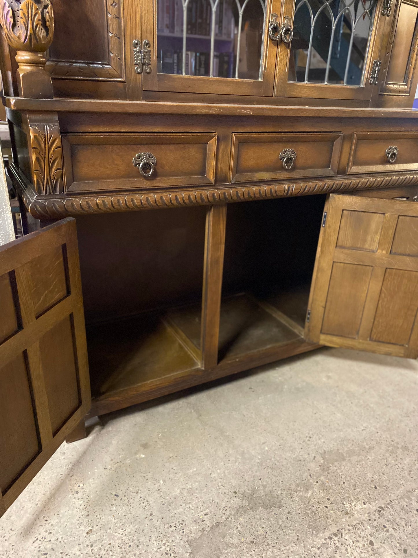 Antique solid oak tall sideboard / cabinet with ornate carvings