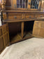Antique solid oak tall sideboard / cabinet with ornate carvings