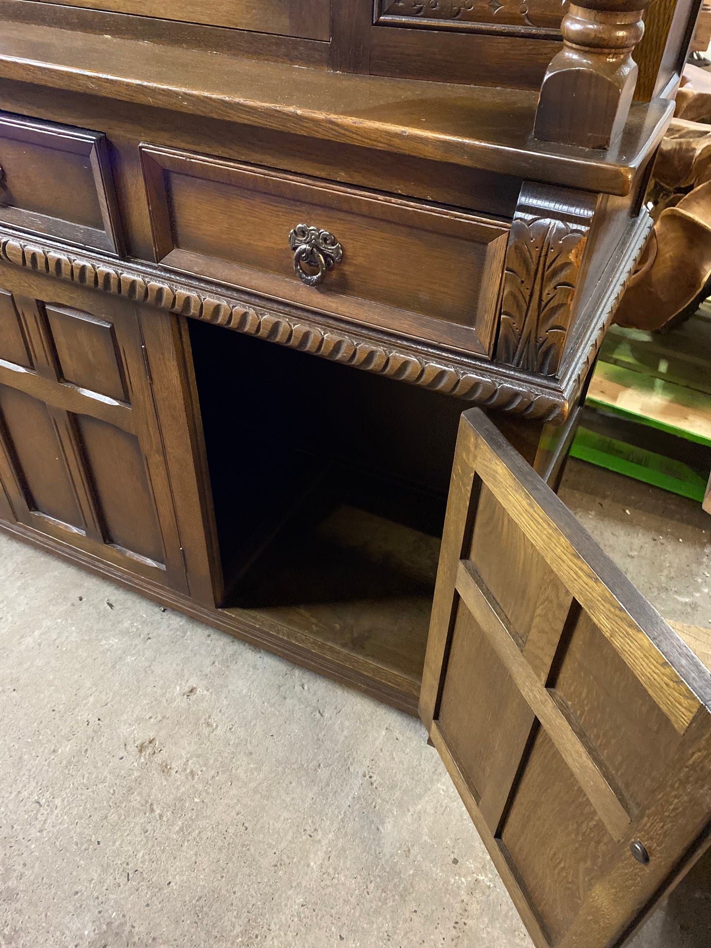 Antique solid oak tall sideboard / cabinet with ornate carvings