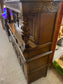 Antique solid oak tall sideboard / cabinet with ornate carvings