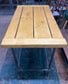 Poseur table with industrial metal base