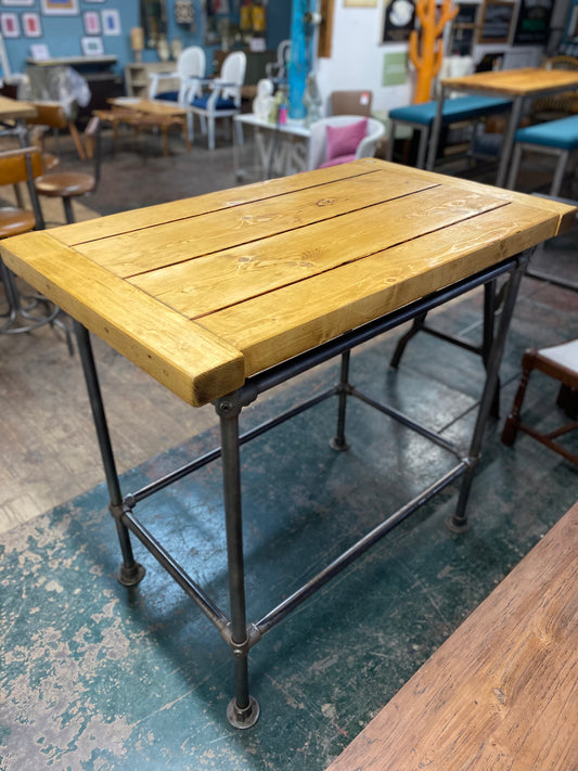 Poseur table with industrial metal base