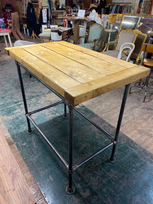 Poseur table with industrial metal base