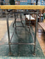 Poseur table with industrial metal base