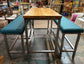 Industrial metal framed poseur table and benches