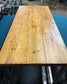 Industrial metal framed poseur table and benches