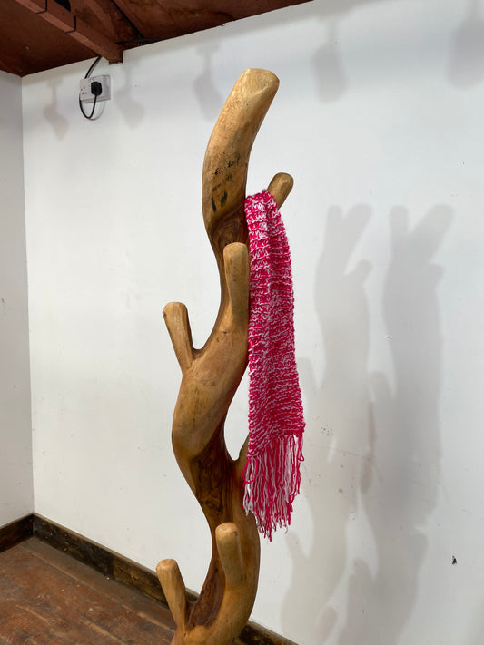 Tree trunk coat stand