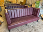 Long burgundy pub / bar / cafe bench in faux-leather