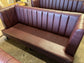Long burgundy pub / bar / cafe bench in faux-leather