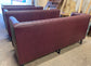 Long burgundy pub / bar / cafe bench in faux-leather