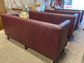 Long burgundy pub / bar / cafe bench in faux-leather